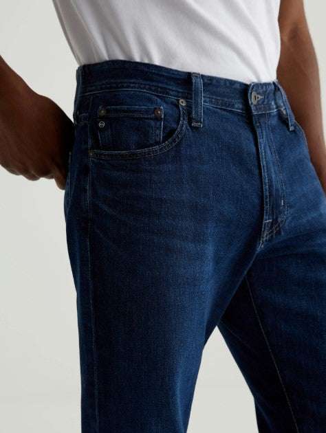 Men wearing AG Jeans Everett slim straight leg dark wash jeans showcasing modern comfortable fit