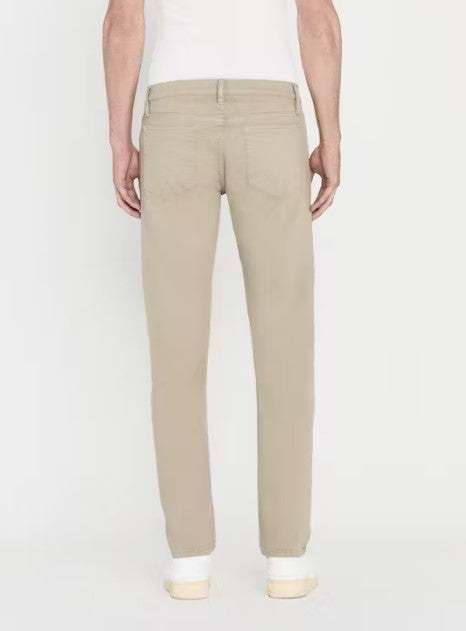 Men wearing Frame L'Homme slim-fit twill jeans designed for comfort and modern style