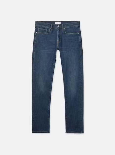 Men wearing Frame L'Homme Slim Jean in slim fit, mid-rise, premium stretch denim with tapered legs and classic 5-pocket design.