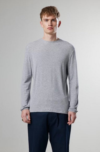 Male model wearing grey NN07 Clive Waffle knit tee in soft cotton and TENCEL modal blend jersey