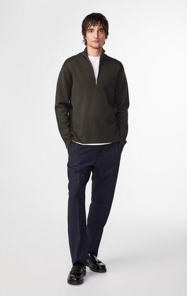 NN07 Harald Wool blend half zip sweater in dark green with Milano stitch and tubular hem details worn by man