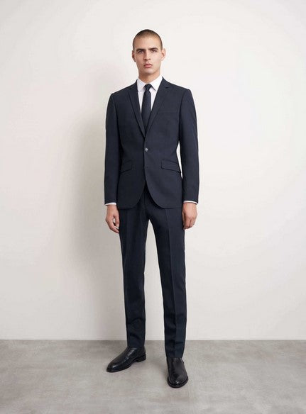 Tiger of Sweden Justins jacket in navy check worn by male model with matching pants