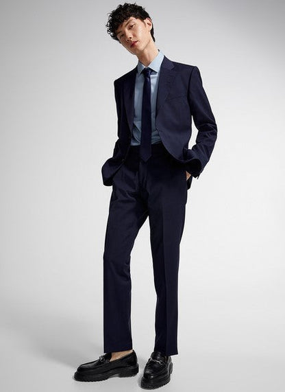 Slim fit Tiger of Sweden Justinn Jacket with wide notch lapel and two-button closure worn by model