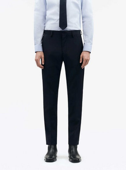 Tiger of Sweden Tenutas Pant black slim fit formal trousers worn with light blue shirt and black tie