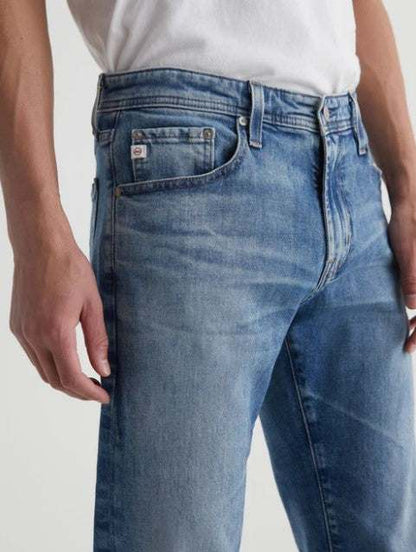 AG Tellis Aged Modern Slim Denim light blue men's jeans with 19-year fade and relaxed slim fit