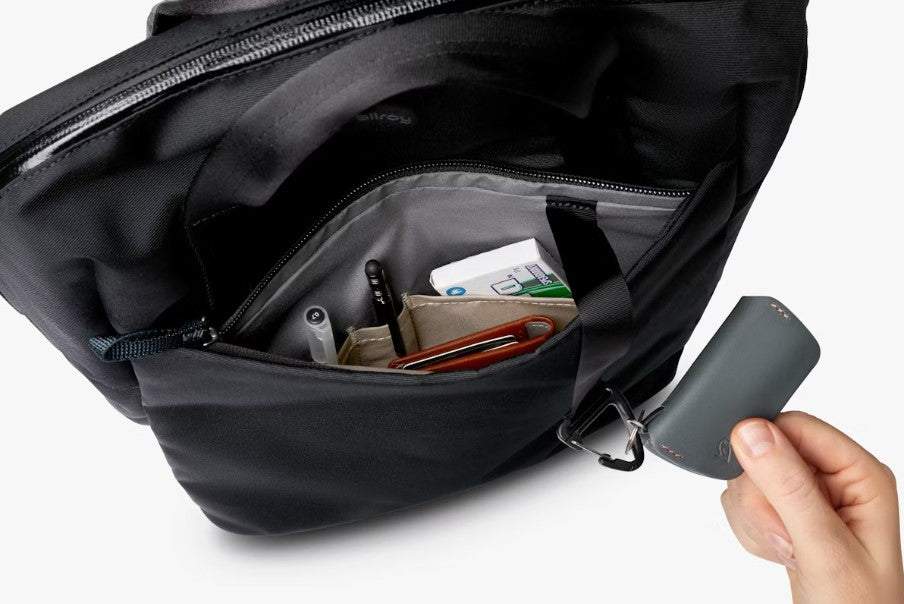 Bellroy Via Workpack black commuter backpack with padded laptop sleeve and quick-access pocket showing organized interior and key clip detail