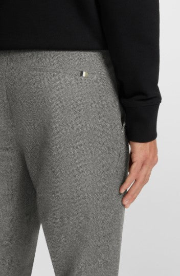 Hugo Boss Micro-patterned slim-fit trousers in virgin wool